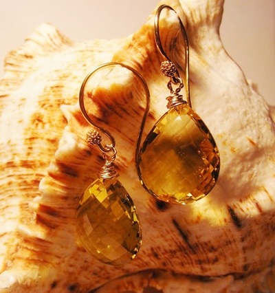 loveley large facetted natural pear shape Citrine drops with 9ct gold earwires.