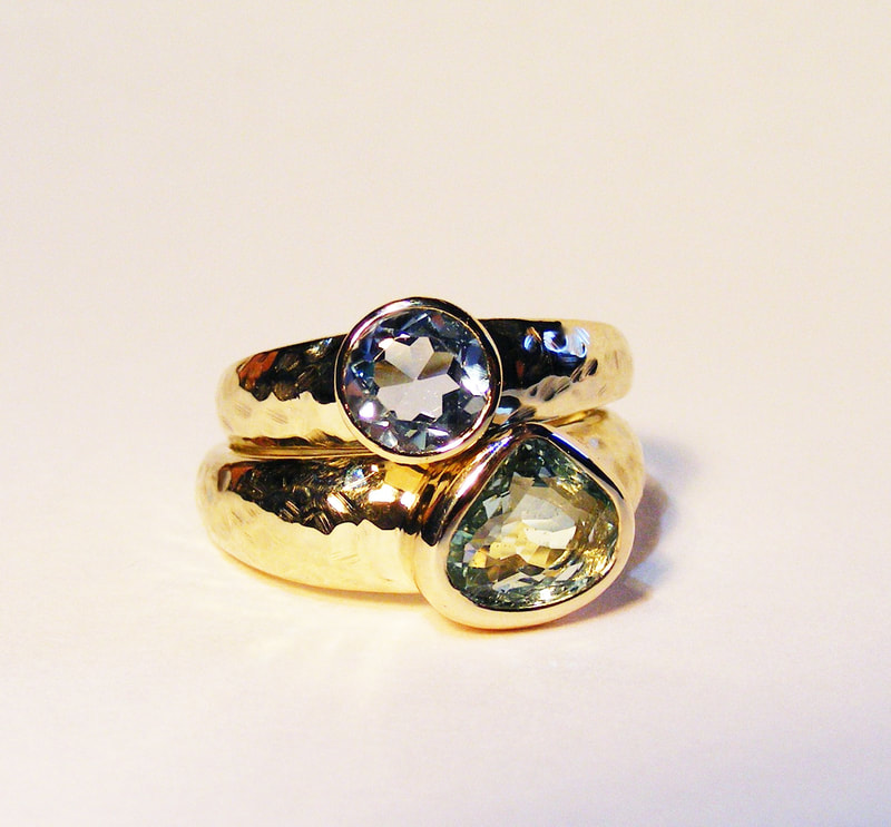 Aquamarine & gold rings
