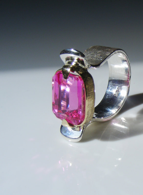 Pink topaz, silver & gold ring