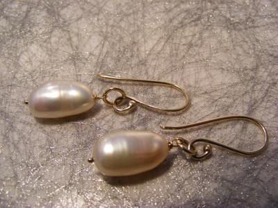 Natural barrel shaped baroque pearls on gold Earwires