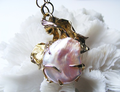 Huge, natural, rare, pinky colour natural Biwa Baroque pearl pendant, with crashing waves of solid gold, encasing the natural pearl. with handmade gold circles of gold chain.