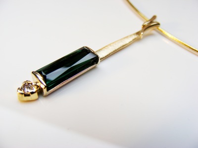 Natural Dark green long tourmaline pendant, with 9ct gold & natural, conflict-free diamond, on cable necklet 