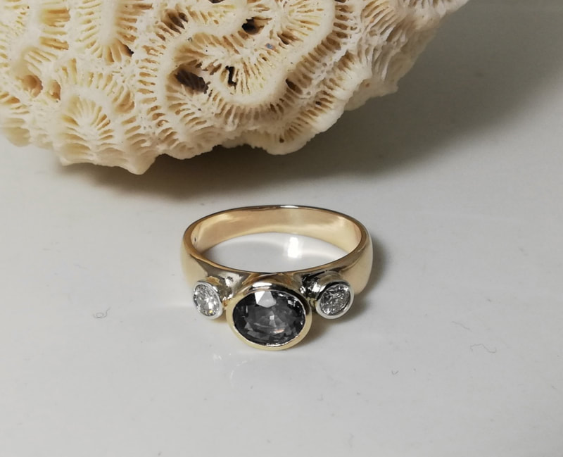 Dark tourmaline & diamond yellow gold ring