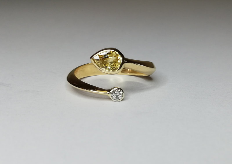 Pear-shape yellow sapphire & diamond ring
