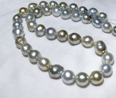 Beautiful, luminous, natural silvery grey, warm grey, golden grey natural tahitian pearl row. 