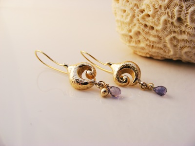 Solid gold curled shape Earrings, with sapphire briolette droplets