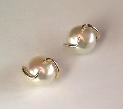 Huge, bold, natural 12mm baroque pearl earstuds encased in tendrils of solid gold