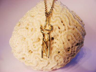 'the lovers' entwined solid gold small pendant, on gold chain 