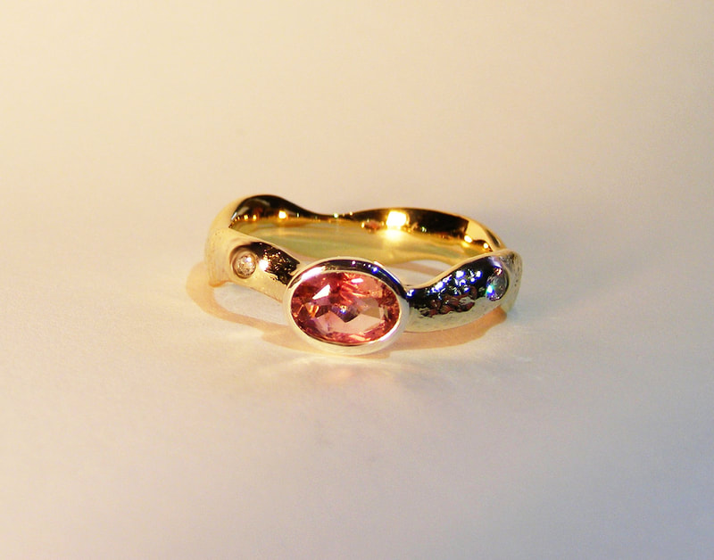 Pink sapphire & diamond wavy ring