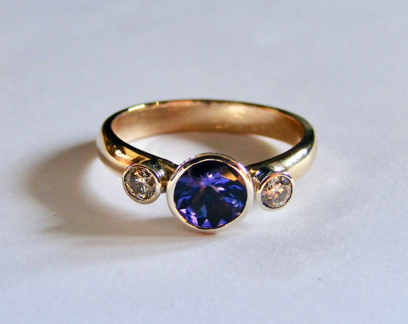 tanzanite & diamond 3 stone ring